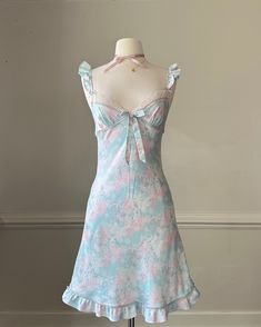 - Adorable tea slip dress featuring multi pastel colored ditsy with ruffled sleeves and trimmings- laced bustier; oversized bow adorned; adjustable straps- size S- great condition, singular snag line at the back (not noticeable unless closely inspected) 🤍 Size of mannequin: size 2 - 4 Spring Coquette Dress With Ruffle Hem, Spring Coquette Dress With Lace Trim, Feminine Ditsy Floral Print Dress With Ruffled Straps, Coquette Floral Print Summer Dresses, Coquette Summer Floral Print Dresses, Pastel Ruffled Dresses For Spring, Spring Ruffle Dress In Coquette Style, Coquette Dresses For Spring Garden Party, Cute Pastel Ruffled Dresses