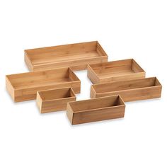 six wooden trays stacked on top of each other with one empty container in the middle