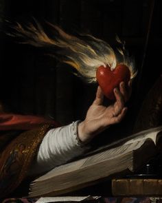 a painting of a person holding an apple in their hand with hair flying around them