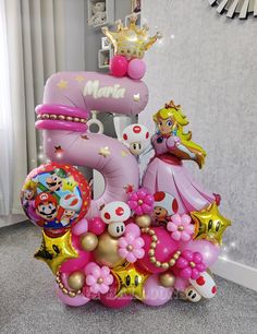 this is a birthday cake made out of balloons