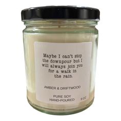 a jar with a label on it that says maybe i can't stop the downpour but i will always join you for a walk in the rain