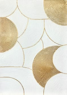 gold and white wallpaper with circles on it