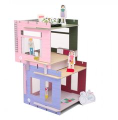 the doll house is made out of cardboard