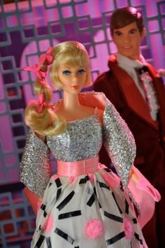 barbie doll and man dressed in formal clothing