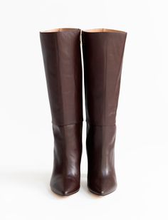 The Celina Boot is the quintessential tall boot. Featuring soft brown leather, a pointy toe, chunky heel and interior zipper, you'll want to get this boot in every color! 4 millimeter padding for a bit more comfort. Comes with dust bag. Runs small. Order one full size up. DETAILS 100% LeatherHandmade in MexicoTops measure 13.5 inches3.5 inche heel Tall Boot, Black Orchid, Every Color, Soft Brown, 5 Inch Heels, Zadig And Voltaire, Tall Boots, Chunky Heel, Brown Boots