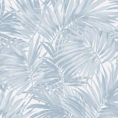 a blue and white wallpaper with palm leaves