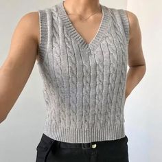 Revamp your wardrobe with this stunning Women's Sweater Vest! This casual, retro, and preppy-style pullover features a trendy V-neck and a sleeveless design, giving you a crop top oversized sweater that is perfect for any season. Made from durable polyester, this sweater provides medium stretch for a comfortable fit. Add a touch of adventure to your outfit with this solid-colored, regular-fit sweater that suits the bold and daring in you! Sets Outfit, Sweater Vest Women, Sleeveless Pullover, Mini Dresses Summer, Romper With Skirt, Sleeveless Sweater, Fitted Sweater, Oversized Sweater, Mini Dress With Sleeves