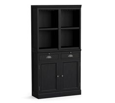 a black bookcase with two doors and drawers on the bottom, in front of a white background