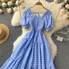 Trendy Blue A-line Dresses, Light Blue Non-stretch Knee-length Dress, Blue Non-stretch A-line Dress, Light Blue Non-stretch Midi Dress, Non-stretch Light Blue Midi Dress, Blue Non-stretch Midi Length Dress, Blue Non-stretch Sundress, Tiered Dresses For Picnic, Blue Non-stretch Midi Dress