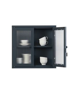 an open cabinet with dishes and cups in it