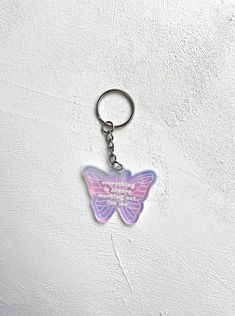 a keychain with a butterfly on it