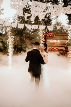 Dancing on the clouds + sparklers so grateful to our dj for this magical moment ✨ @djbebo on insta 📷: @arcfilm on Insta | dancing on the clouds | sparklers | Mexican wedding inpo | hacienda style wedding | Mexican wedding decor | rancho wedding | wedding papel picado | wedding florals inspiration | mexican culture inspired wedding | weddings in Mexico | Mexican inspired ranch wedding | #haciendastylewedding #mexicanweddingdecor #mexicanweddingflorals #dancingontheclouds #weddingsoarklers Rancho Wedding Mexican, Mexican Wedding Decor, Wedding Papel Picado, Hacienda Style Wedding, Rancho Wedding, Mexican Style Wedding, Papel Picado Wedding, Wedding Mexican, Weddings In Mexico