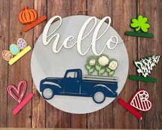 a paper plate with the word hello written on it, surrounded by cut out decorations