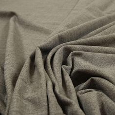 a close up view of a gray fabric