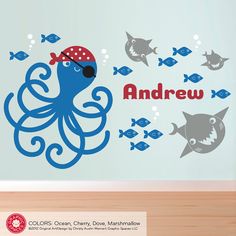 an octopus wall decal with the name connor in blue and green, surrounded by fish