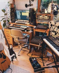 a room filled with musical instruments and sound equipment