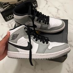 The Air Jordan 1 Mid “Light Smoke Grey” Finds Michael Jordan’s First Signature Shoe In Mid-Top Form In A Shadowy, Ultra Versatile Color Scheme. Size Mens 7.5 I Am A Size 8 - 8.5 Womens And They Fit Me Perfectly. Jordans 1 Gray, Jordan 1 Gray, Nike Air Jordans, Air Jordan 1 Mid, Michael Jordan, Jordan 1, Womens Shoes Sneakers, Nike Women, Nike Shoes