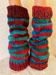 "** BEFORE ORDERING - Please check current processing and shipping times! This item is MADE TO ORDER. ** Perfect for Christmas elves everywhere! Two stripe red and sea-green hand-knitted leg warmers in warm, soft, easy-care acrylic yarn. Machine washable, and totally unique - no two pairs the same! The leg warmers are all 16\" long, and can be made in two widths: Standard - max 14-16\" (fully stretched) around (size shown in photos) Wide - max 16-18\" (fully stretched) around. It is advisable to measure around the widest part of your leg to make sure these will fit before ordering. If you require a different fit to those shown, please get in touch. Children's sizes available in a different listing.   Photos for example only. The arrangement of colours will vary in each pair. They will be m Red Leg Warmers For Winter Stocking Stuffer, Casual Multicolor Knitted Leg Warmers, Fitted Multicolor Leg Warmers For Winter, Multicolor Knitted Leg Warmers For Fall, Multicolor Knitted Leg Warmers For Winter, Cozy Knitted Multicolor Leg Warmers, Cozy Multicolor Knitted Leg Warmers, Red Fitted Leg Warmers For Winter, Fitted Red Leg Warmers For Winter