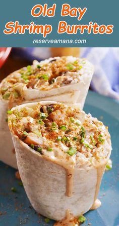 old bay shrimp burritos on a blue plate with text overlay that reads old bay shrimp burritos daydream - beliver org