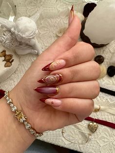 Red Gold French Nails, Red Wine And Gold Nails, Gold And Burgundy Nail Designs, Dark Red With Gold Nails, Red Nails With Gold Details, Red Ethereal Nails, Gold And Wine Nails, Wine Red Nails Aesthetic, Wine Red Nails With Design