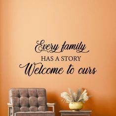 a wall decal that says, every family has a story welcome to ourss