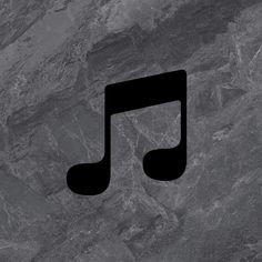 a black musical note on a gray marble background