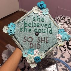 a decorated graduation cap that says she beliveed she could so she did it