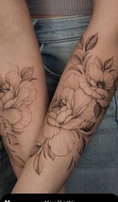 two women's arm tattoos with flowers on them