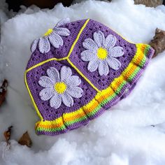 Would you like to spread positive energy around you with colorful floral motifs?  This knitted crochet daisy motif bucket hat is for you. In festivals, concerts, on the streets, in short, wherever there is life, all people will watch you. Cotton knitted hats  combined with these vibrant colors are waiting for their owners. Avaliable in any size of colour, custom orders always welcome Message for any enquires Visit our shop for more crochet hat items. Embrace the charm of nature with our lovely Knitted Daisy Bucket Hat. Handcrafted with care and adorned with adorable daisy motifs, this hat is the perfect blend of style and comfort. Designed to keep you stylishly shaded on sunny days, this bucket hat adds a touch of whimsy to any outfit. The soft, cozy, and breathable knit ensures a comforta Purple Crochet Beanie Hat For Spring, Purple Crochet Beanie For Spring, Whimsical Summer Crochet Bucket Hat, Spring Bucket Hat In Purple, Spring Purple Bucket Hat One Size, Spring Festival Crochet Beanie Hat, Purple Summer Bucket Hat, Playful Crochet Bucket Hat For Spring, Playful Spring Crochet Hat