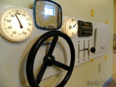 an image of a car dashboard with clocks on the wall