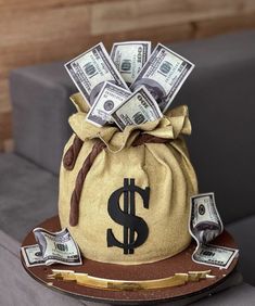 a bag filled with money sitting on top of a couch