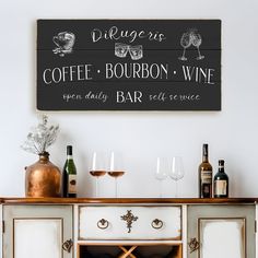 there is a sign that says coffee bourbon wine on the wall