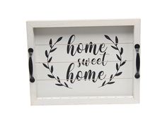 a white box with the words home sweet home written in black ink on it and an olive branch