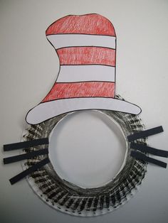 a drawing of a cat in the hat on top of a hair dryer brush