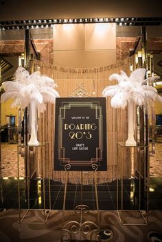 the entrance to an art deco themed event