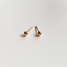 Our gold tiny stud earring pack is minimalist and chic!! Perfect for everyday wear and for multiple piercings. The set includes 4 mini geometric earring pairs; sphere, flat disc, heart and star shapes. Great for gifting - all of our jewelry comes in gift ready packaging. -- one pair gold filled tiny heart stud earrings (3.5mm) one pair gold filled star stud earrings (3.5mm) one pair gold filled sphere earrings (3 mm) one pair gold filled dot earrings (4mm) earring backs included: gold filled scr Trendy Tiny Gold Cartilage Earrings, Minimalist Hypoallergenic Yellow Gold Nose Studs, Minimalist Everyday Round Nose Studs, Minimalist Gold Piercings With Matching Earrings, Minimalist Gold Hypoallergenic Cartilage Earrings, Minimalist Hypoallergenic Yellow Gold Plug Earrings, 14k Gold Minimalist Nose Studs For Gift, Minimalist Nose Studs For Everyday Wear, Minimalist Hypoallergenic Nose Studs As Gift