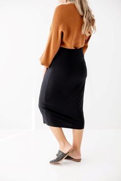 Effortless and elegant, the 'Sasha' is what skirt dreams are made of! Tailored in a modern midi length, this soft knit pull-on skirt is fitted with a hidden elastic waistband for a secure fit. From everyday wear to business casual to Sunday morning - this basic skirt is a must have for every modest wardrobe! Exclusively designed with you in mind. 95% Rayon 5% Spandex Hand Wash Cold Do Not Bleach Lay Flat or Hang to Dry Low Iron if Needed Partially Lined Model Height 5'6" | Wearing Size Medium Pl Modest Fitted Skirt With Elastic Waistband, Stretch Lined Maxi Skirt For Daywear, Modest Stretch Midi Skirt, Chic Pencil Skirt For Loungewear, Modest Stretch Skirt With Elastic Waistband, Stretch Pencil Skirt With Lined Detail For Day Out, Stretch Lined Pencil Skirt For Day Out, Chic Lined Skirt For Loungewear, Chic Loungewear Skirt With Elastic Waistband