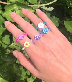 This gorgeous flower beaded ring is made with polymer clay flower beads and glass seed beads on aluminium wire. They are great pop of colour! You can customize the flower and bead colour to make YOUR perfect ring! Flower bead: 8x4mm Same Ring Without The Flower Bead: https://etsy.me/3414RZ4 Please note to keep in best condition, avoid contact with water More from our shop: Turquoise braided ring- https://etsy.me/33UQVQF Braided rings- https://etsy.me/3u3noPW Gold resin rings- https://etsy.me/3tveARV Flower Beaded Ring, Beautiful Anklet, Stock Flower, Ring Flower, Beaded Ring, Braided Ring, Clay Flower, Polymer Clay Flowers, Resin Ring