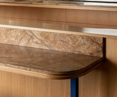 a marble counter top in a wood cabinet