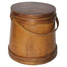 an old wooden bucket with handle on white background