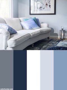 a living room with blue and white colors in the color scheme, including grays