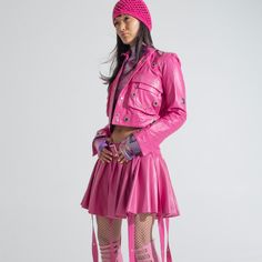 Planked pink leather skirt with metal eyelets and pink leather straps, you can wear it with the Pink Angel jacket and make the total look.  With this collection, Paloma looks back to her teenager in which she based big part of her identity, representing this side or her in a nostalgic way. Under the Black Rainbow collection and prints are inspired in countercultures and social groups that represent this late 90’s and early 2000’s, being these groups influential in emo, punk and grunge aesthetics Pink Punk Outfits, Pink Alternative Fashion, Pink Leather Skirt, Grunge Aesthetics, Pink Punk, Pink Angel, Black Rainbow, Pink Vibes, Punk Outfits