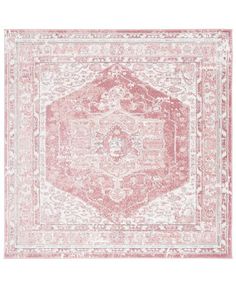 a pink and white rug with an ornate design