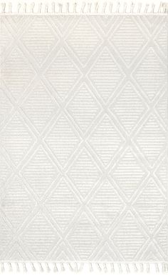 a white rug with fringes on it