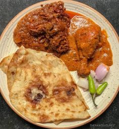 a white plate topped with different types of food