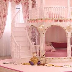 a pink princess castle bed in the corner of a room