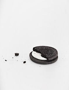 an oreo cookie is laying on the ground