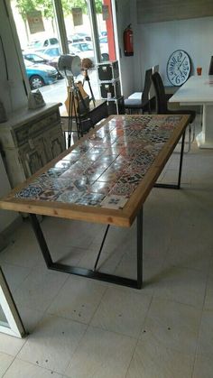 a table that is sitting in the middle of a room