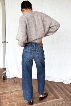 The Barrel Jean is a new wide leg and an updated denim trouser. It sits lower on the waist with a loose fit through the legs and tapers from the knee down. The side seams curve toward the front and create a slight curved, slouchy leg barrel silhouette with Vintage work wear front pockets and curved back pockets. Wash: A dark indigo vintage wash, in premium non-stretch 100% cotton Italian denim Button and zipper closure Made in the USA Size 27: Waist 29 3/4 Front rise 11 1/2” Leg opening 17 ” Ins Embroidered Shirt Dress, Emerson Fry, Voile Dress, Vintage Indigo, Curved Back, Dark Indigo, Denim Shoes, White Shirt Dress, Denim Trousers