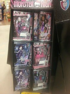 the monster high toys are on display for sale